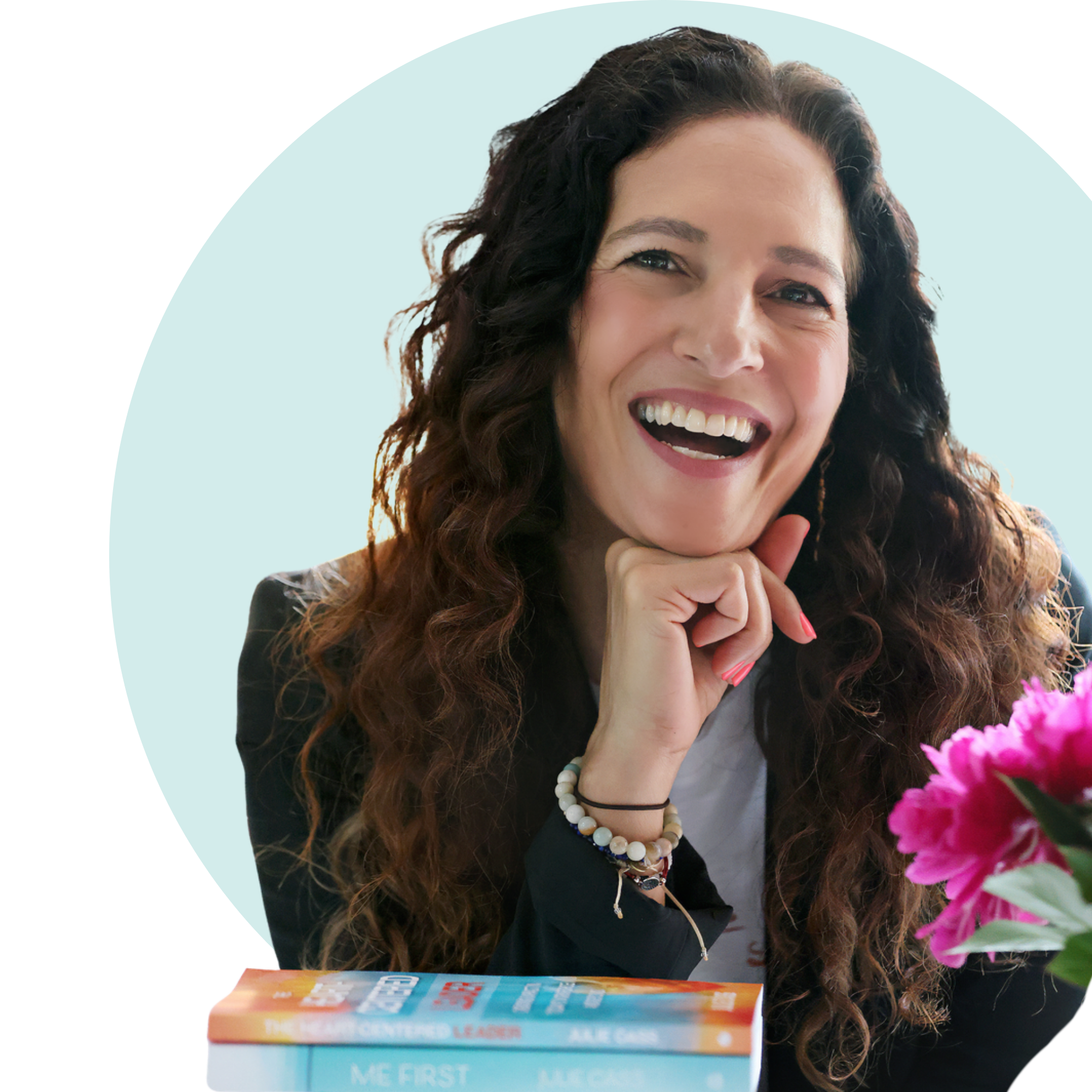Julie Cass smiling with books